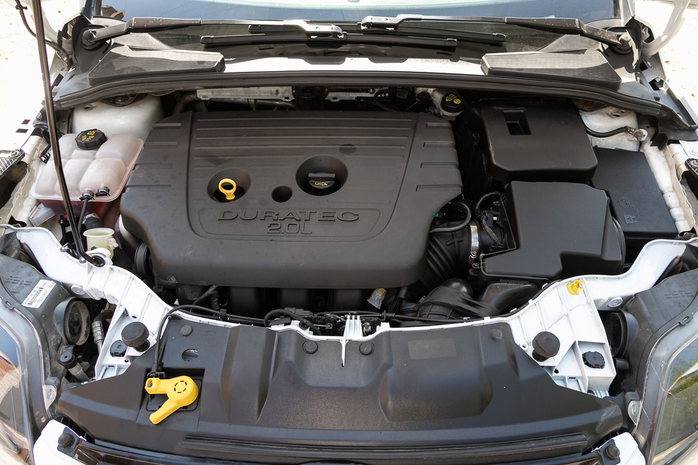 The hood open to show the engine of a vehicle. | Auto service in Little Rock, AR.