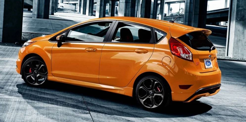 A 2019 orange Ford Fiesta parked in a garage. | Ford service center in Little Rock, AR.