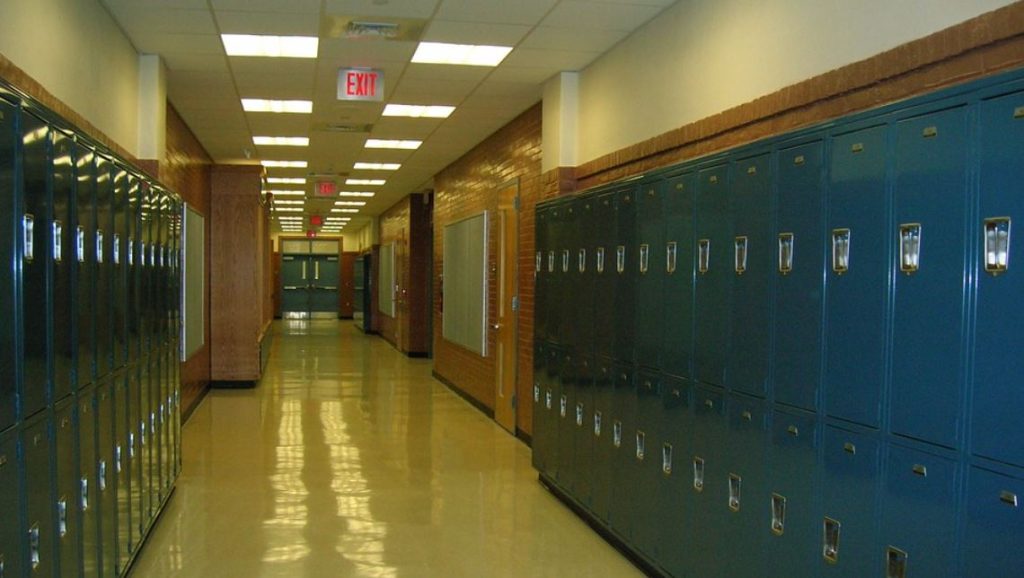 A hallway lined with lockers in a school. | Historical attractions in Little Rock, AR.