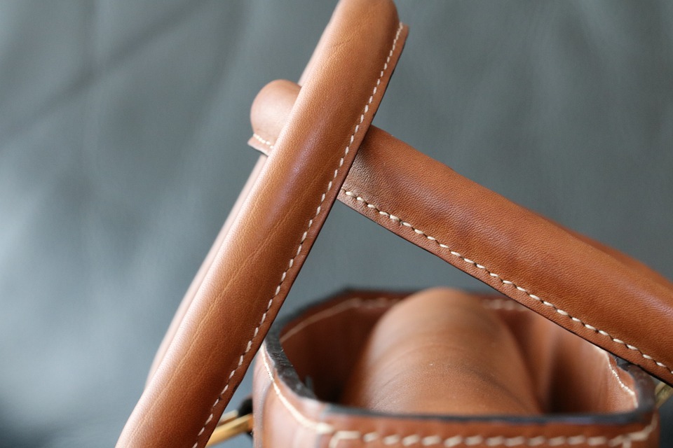 Close view of the purse handles of a light brown leather purse. | Things to do around Little Rock, AR | Crain Hyundai of Little Rock