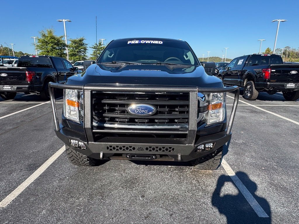 Used 2021 Ford F-150 XLT with VIN 1FTFW1E59MFC98313 for sale in Little Rock