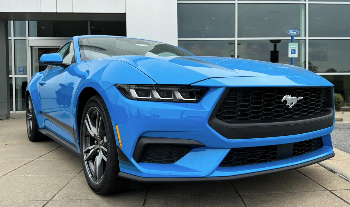 Close up of a 2024 blue Ford Mustang